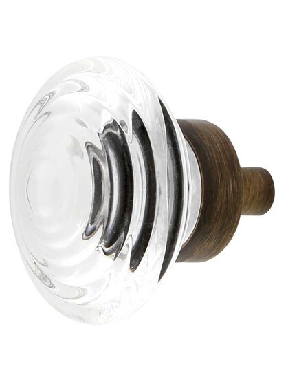 Deco Style Clear-Glass Cabinet Knob with Brass Base - 1 1/4 inch Diameter in Antique Brass.